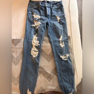 Distressed Blue Jeans